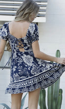 Oswell Short Sleeve Dress W A Smock Top and Tie Up Back