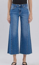 Tate High Rise Raw Hem Twist Wide Jeans