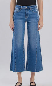 Tate High Rise Raw Hem Twist Wide Jeans