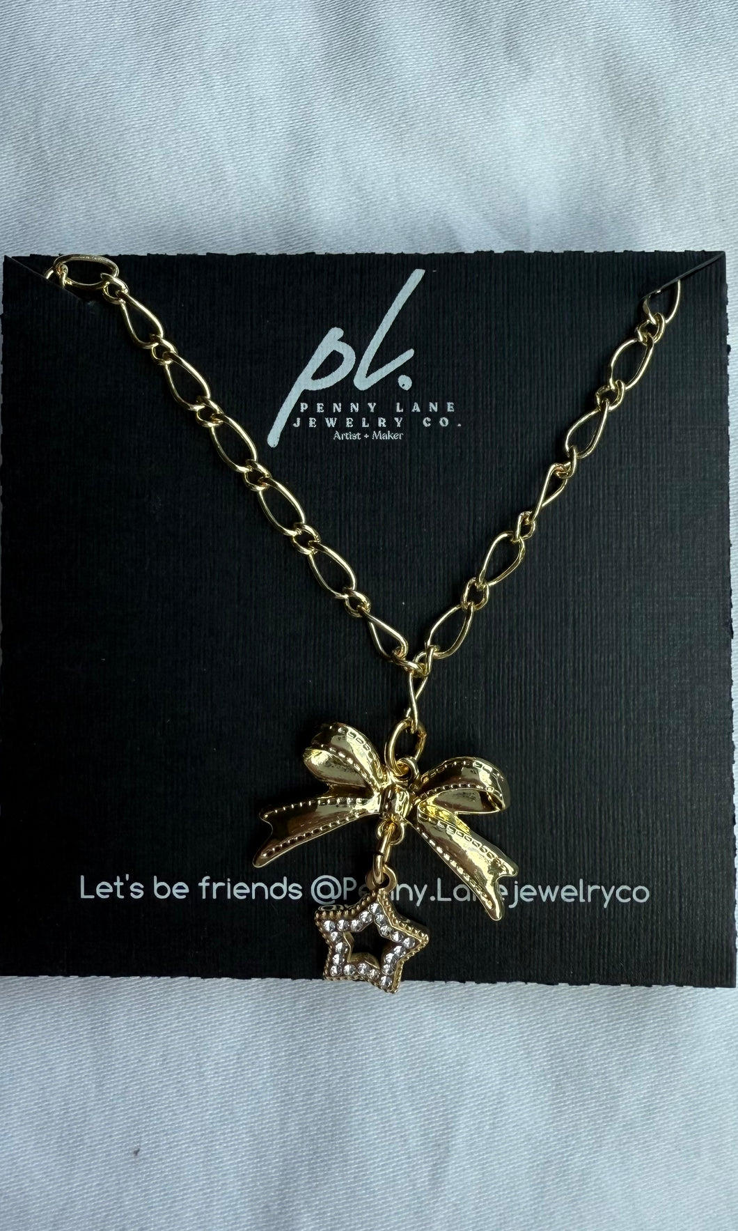 Anastasia Golden Bow and Rhinestone Star Necklace