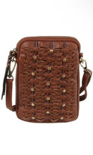 Brown leather crossbody bag with woven pattern on a white background