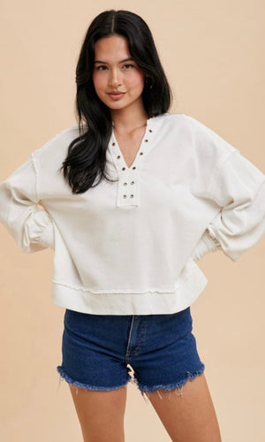 Dana White V Neck Grommet Detail Pullover Sweater