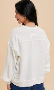 Dana White V Neck Grommet Detail Pullover Sweater