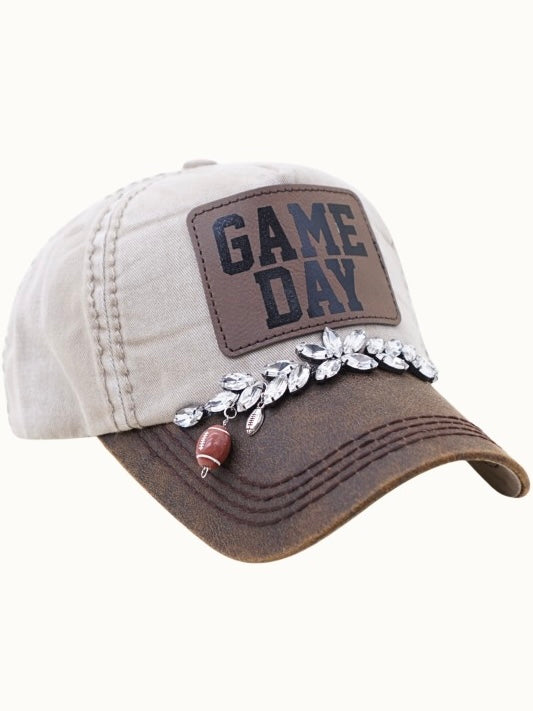 Cap with 'Game Day' patch and decorative elements on a white background