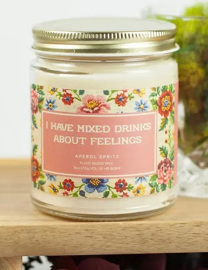Jar with floral label and text on a wooden surface