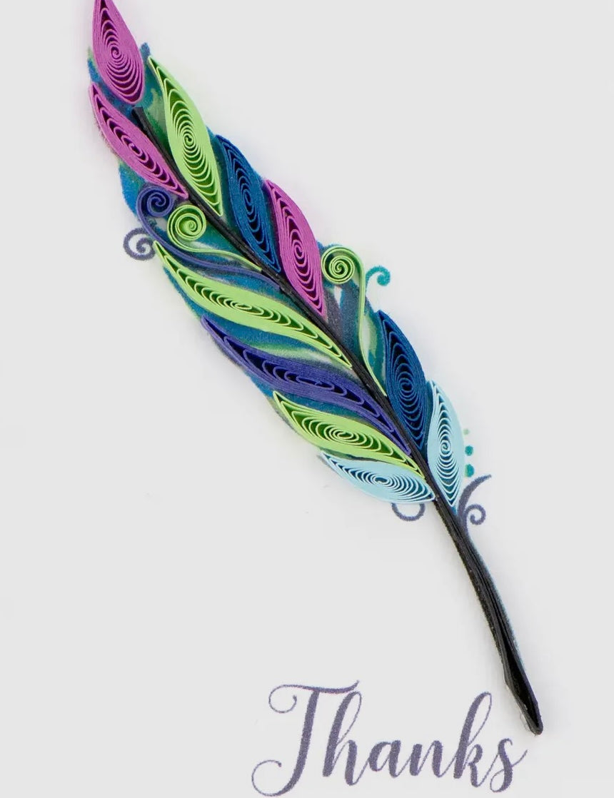 Colorful feather with decorative patterns on a white background, featuring the word 'Thanks'.