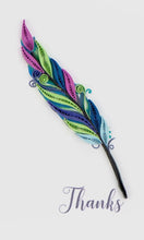 Colorful feather with decorative patterns on a white background, featuring the word 'Thanks'.